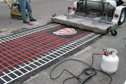 Asphalt Reheat Systems’ Manta Ray was used to install thermoplastic markings and a Badger logo at the University of Wisconsin-Madison.