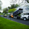 The first lift of the parking lot was a 2.5-in. lift of binder which was then compacted to 2 in. A second 2.5-in. lift and compaction to 2 in. followed.