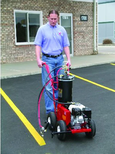 The airflow in a conventional (often termed an 'air' machine) goes to four places: the paint pot, striping gun, cleaner can, and stencil gun. Courtesy Newstripe Inc., www.newstripe.com..