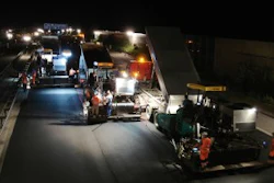 On the A 99 near Munich, Germany, four Vogele Supere 1800-2 pavers with SprayJet Module worked in echelon 'hot to hot' to produce a noise-reducing thin asphalt overlay.