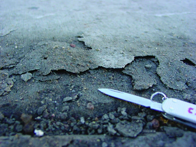 Scaling, above, and premature surface wear typically occur when contractors mix bleedwater into the surface or trap bleedwater and air directly beneath the surface.