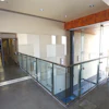 At Miramar College, Surfacing Solutions polished 9,000 square feet of floors, including this second floor area. Crews had to use a lift to get grinders through a framed window because elevators were not working.