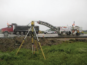 A Topcon Positioning Systems Millimeter GPS+ system utilizes satellite signals in conjunction with a PZL-1 Lazer Zone transmitter (shown here) and a PZS-MC machine-control sensor for precise grade control.