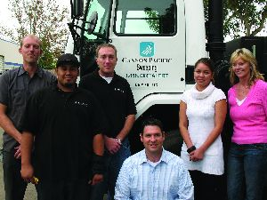 Lee Miller (kneeling) and the crew of Cannon Pacific Services, San Marcos, CA.