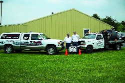Chuck Wallace (left) and his son Dan transformed a weekend sealcoating business into a full-time operation that regularly handled jobs of 100,000 sq. ft. before stepping up to bigger projects.