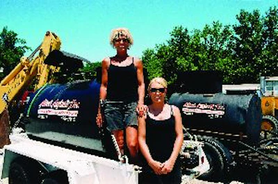 Pam Darst (left) and daughter Nichole Darst before they head out sealcoating.