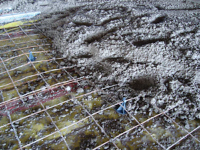 Plastic rebar chairs can help prevent punctures in a vapor retarder that can happen with metal chairs.