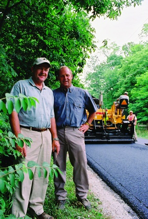 Triangle Asphalt Paving's edge in the market is that brothers Steve (left) and John Day are owners who work in the field.