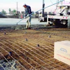 Above and below: Properly placed/supported reinforcement will result in properly located reinforcement in the slab. Consult manufacturers' literature for maximum chair and other support spacing and use a 12-inch minimum reinforcement spacing so workers can avoid walking on the reinforcement.