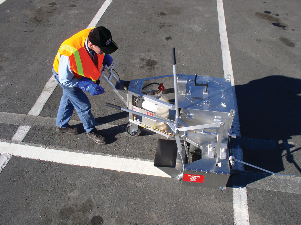 Shorter lines and smaller detail work can often be applied using a thermoplastic handliner. Contractors should preheat the material in a separate melting kettle first to avoid downtime while waiting for the material to heat up.