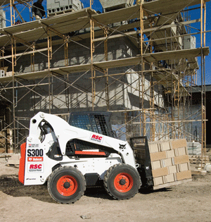 Because skid-steer loaders are so versatile, they are often asked to multi-task. Pallet forks are one relatively common rental attachment.