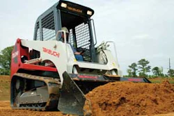 A compact track loader with a standard bucket can do a decent job of grading as long as you fill the bucket with dirt to help balance the machine.