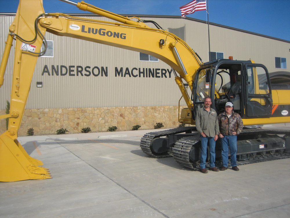 Brett Morgan, left, and Stan Parry of Anderson Machinery went on a nationwide search for a LiuGong excavator with a longer stick and wider bucket to solve a problem for its clients.
