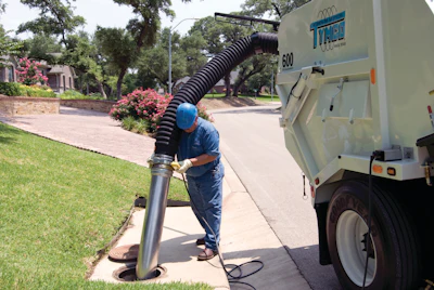 Tymco's hydraulic boom-assist hand hose enables the operator to clean catch basins and hard-to-reach areas.