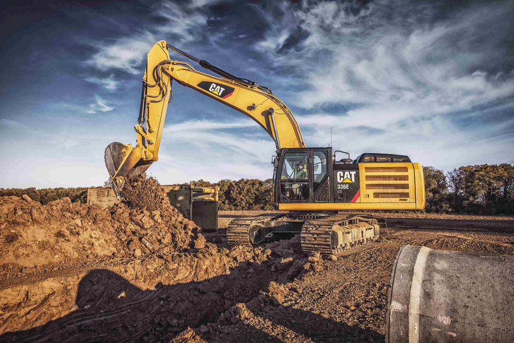 Schlouch Inc. negotiated the purchase of a Caterpillar 336E Hybrid (such as shown) from Giles & Ransome with a performance guarantee based on fuel economy. It halved fuel costs for pipelaying, and Schlouch rented two more with purchase options.