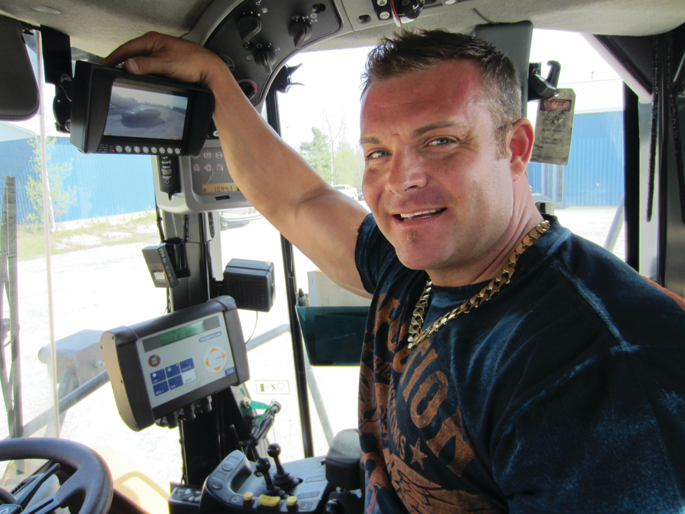 David Pyper appreciates the TRACK-VISION backup camera system in his CAT loader.