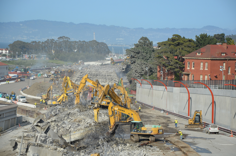 Six excavators were used on each stretch of roadway to demolish the old Doyle Drive in San Francisco within a 57 hour span.