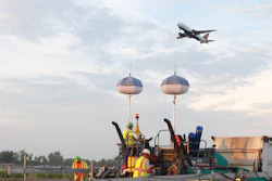 Two Vogele Vision 5200-2 asphalt pavers were used in 24- to 27-ft.-wide passes at the Port Columbus International Airport..