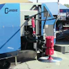 Curbie's double-articulating saw head can turn the blade to cut at almost any angle, and reach more than 50 in. high.