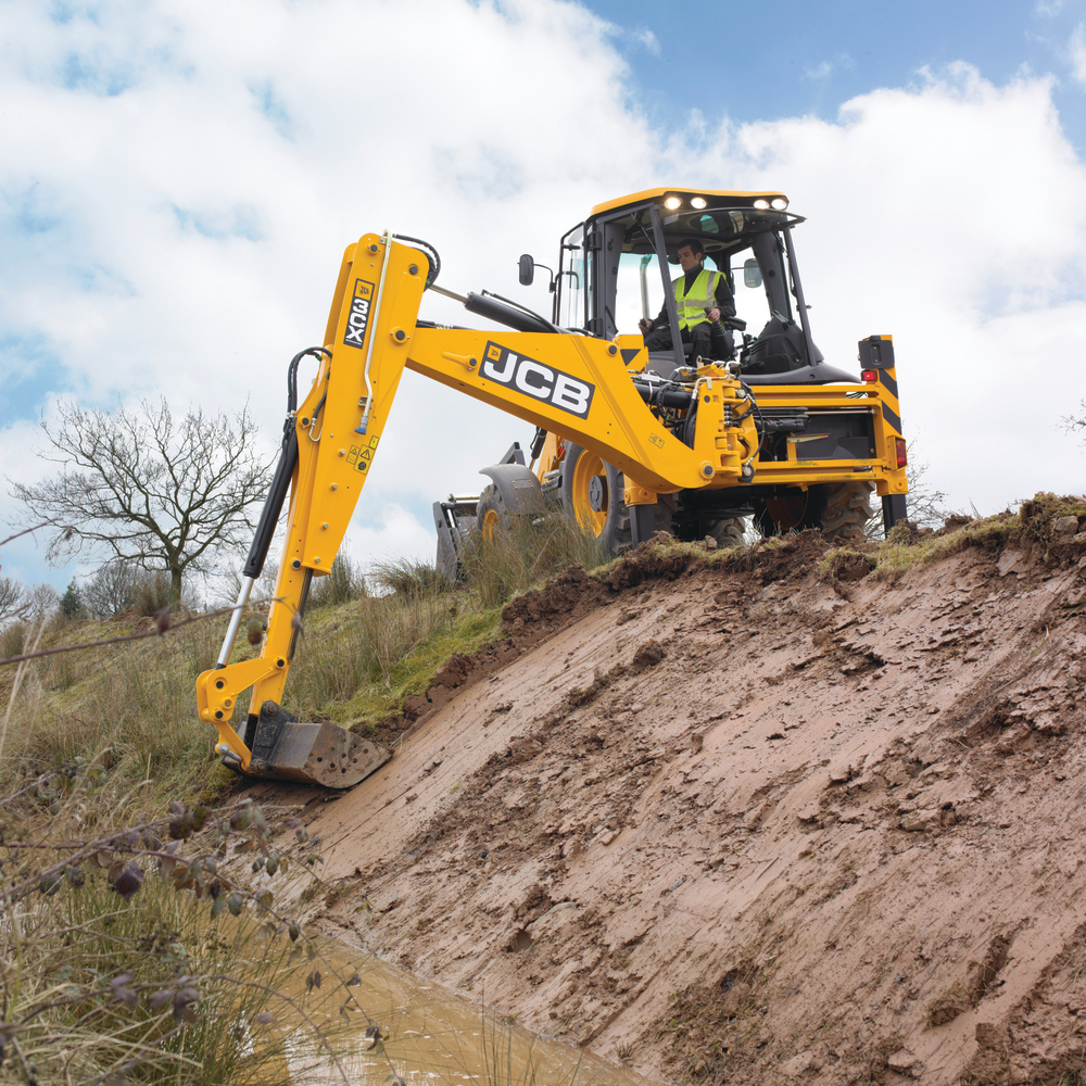 Because the boom can be offset to the left or right, operators of side-shift backhoe-loaders can dig close to the edge of a structure or a trench with less repositioning of the machine required.