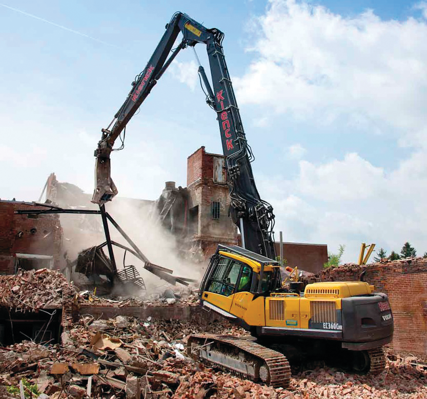 The Volvo EC360C High-Reach excavator had a 69-ft. boom with a multi-processor that crunched the concrete and brick structure with the front part of the jaws and cut through metal in the rear of the jaws.