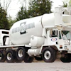 Over the course of four years, Oshkosh S-Series forward placement concrete mixer trucks spent many months running 24 hours per day, six days per week on the Wolf Creek Dam Remediation project.