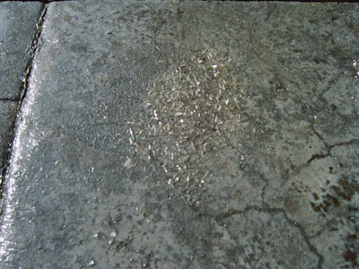 This sealer was over applied. It should have been applied 1 to 2 mils thick, but was likely 20 to 30 mils thick.