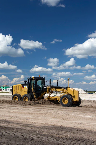 Cat M Series 3 Motor Grader Grading Dirt