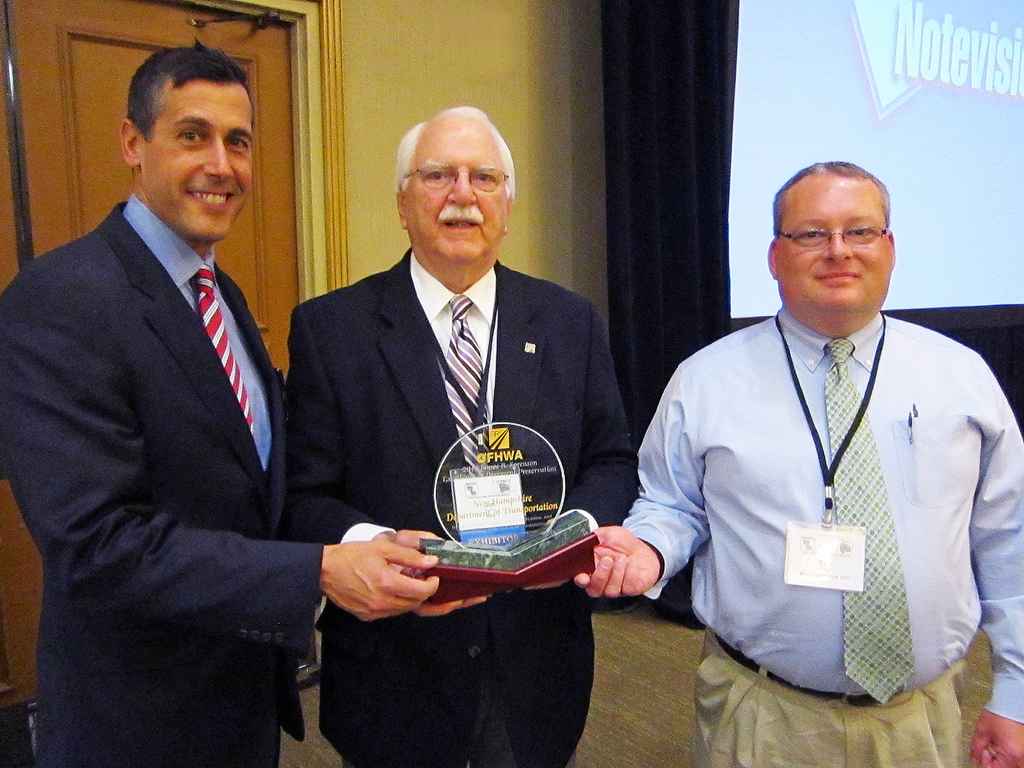 The New Hampshire DOT is honored with FP2 Inc.’s James B. Sorenson Award for Excellence in Pavement Preservation. At Nov. 12 presentation are, from left, NH DOT Commissioner Chris Clement; FP2 executive director Jim Moulthrop; and Eric Thibodeau, chief, pavement management for NH DOT.