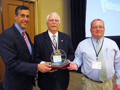 The New Hampshire DOT is honored with FP2 Inc.’s James B. Sorenson Award for Excellence in Pavement Preservation. At Nov. 12 presentation are, from left, NH DOT Commissioner Chris Clement; FP2 executive director Jim Moulthrop; and Eric Thibodeau, chief, pavement management for NH DOT.