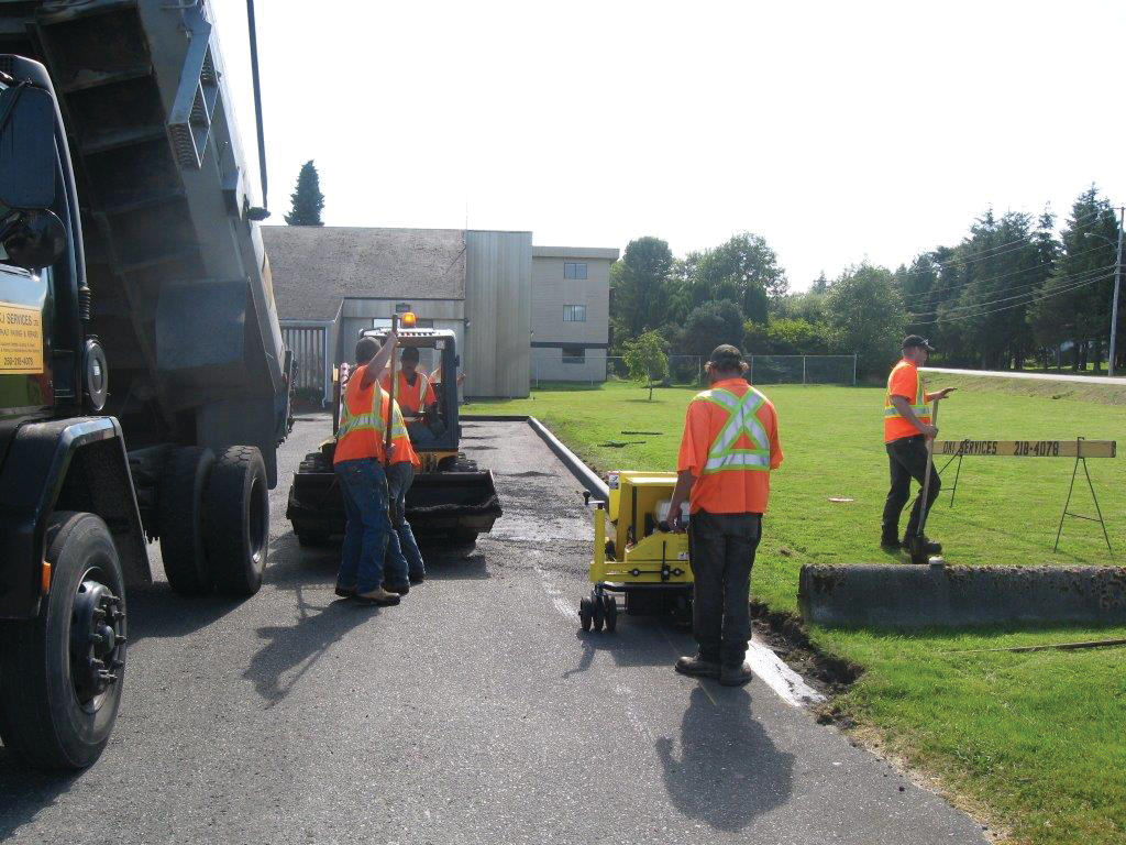 “Backing a gravel truck hauling asphalt into every location isn’t reasonable,” Ingram says. “We use the skid steers for so many jobsite tasks that we wouldn’t leave for a jobsite without a skid steer anymore.”