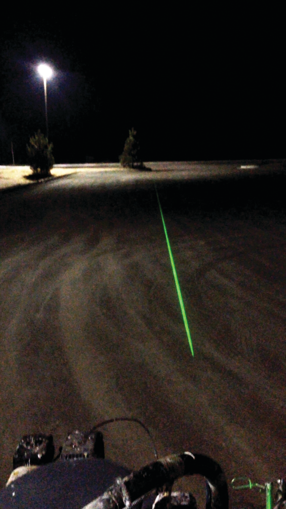 LaserLine can attach to any striping machine and gives the operator a spot reference for a line, or an actual line, when used at night.