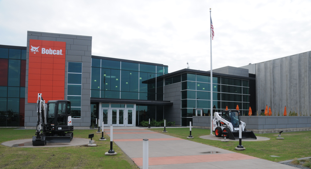 A Bobcat compact excavator and skid-steer loader greet visitors at the new Acceleration Center in Bismarck, N.D.
