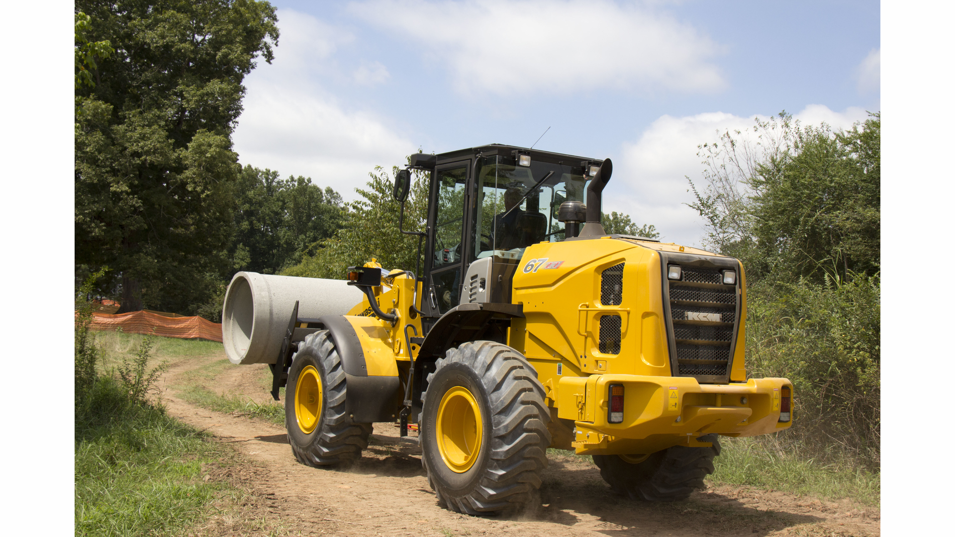Mid-sized wheel loaders such as the Kawasaki 67Z7 are compact enough to maneuver on tight construction sites, while providing the power required to handle a variety of tasks.