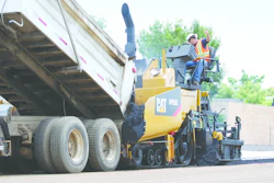 Schlouch Inc. replaced two of its asphalt pavers with new Caterpillar AP555E tracked models (such as the one shown) and featuring extended warranties. The replacements cut the company's paving costs significantly.