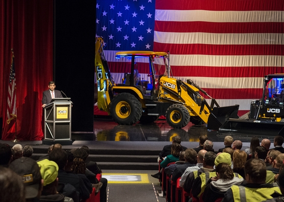 Arjun Mirdha, President and CEO of JCB North America, addresses JCB employees and special guests.