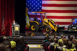 Arjun Mirdha, President and CEO of JCB North America, addresses JCB employees and special guests.