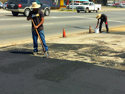 Johnson provides his crew with large hats that allow for a 'create your own shade' alternative.