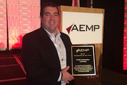 Pat Hunt, Case Construction Equipment's Director of Strategic Accounts, accepts the Associate of the Year award at the annual AEMP conference in Orlando.
