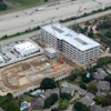 General contractor Hoar Construction LLC had to make two laps around the building erecting the panels – one for the four-story panels and the second lap for the one-story panels.