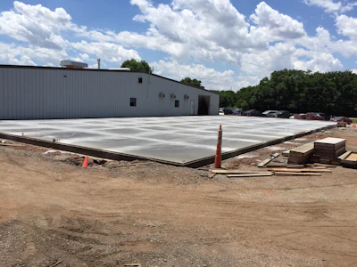 E-Z Drill’s new factory expansion will house an office and a new shipping and receiving area, as well as make room for E-Z Drill’s growing welding department. The project began in June with setting the concrete foundation and is projected for completion by early fall 2015.