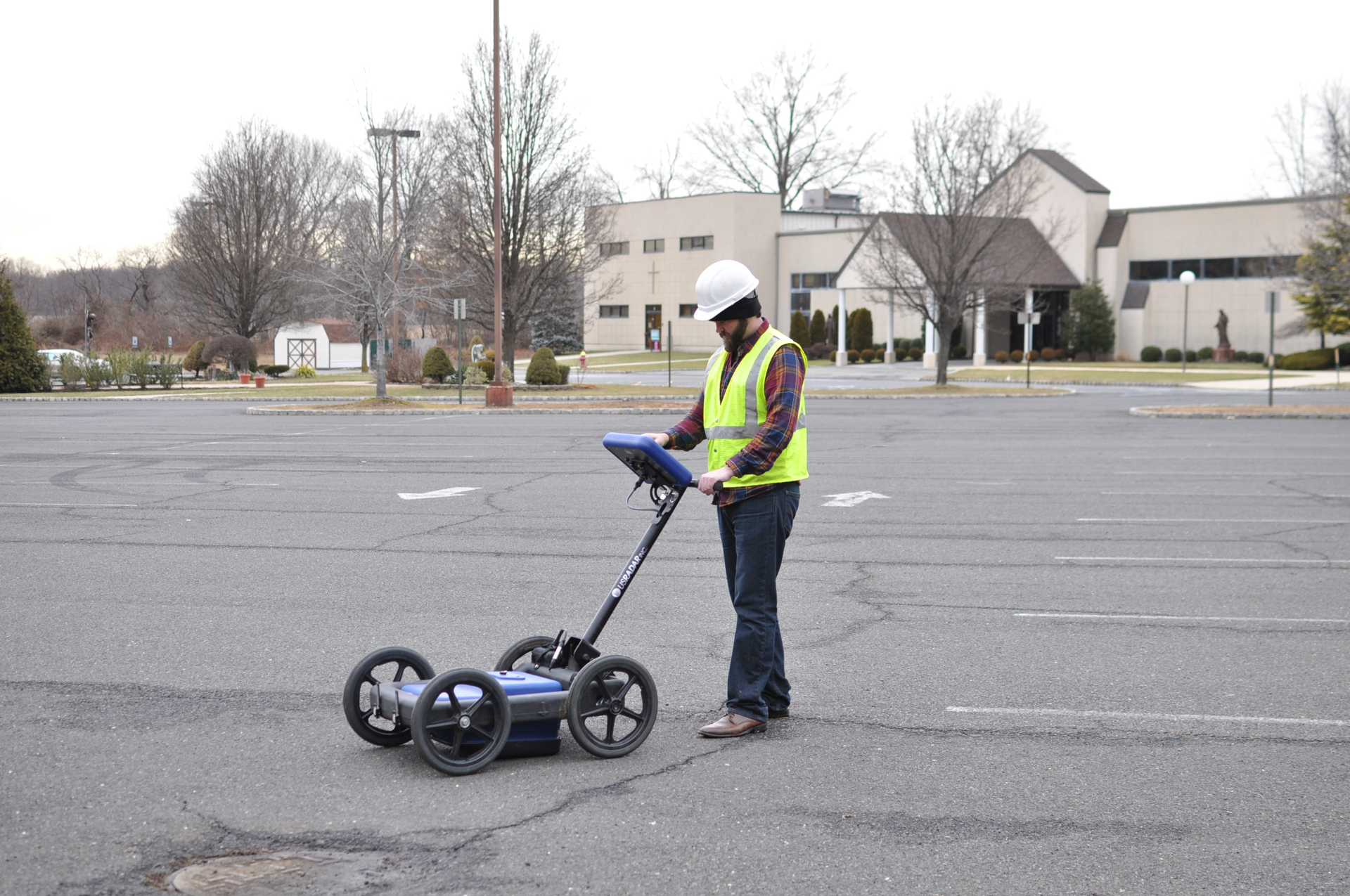 US Radar Q5 by manhole in parking lot 55d63e3d9ca3e