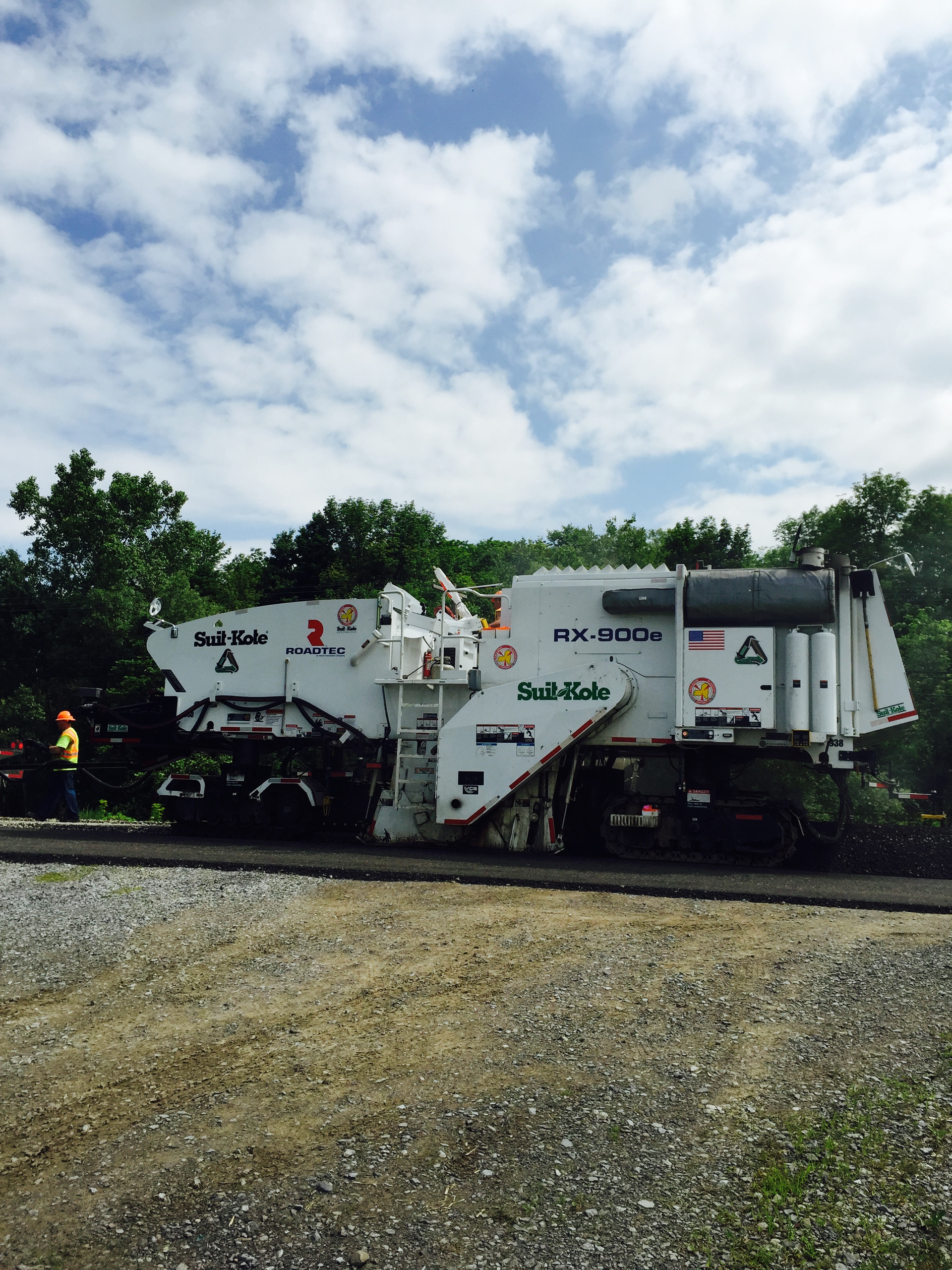 The modified cold planer used on Highway 243 had a 1.5-foot wider frame and no conveyors.