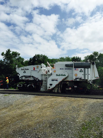The modified cold planer used on Highway 243 had a 1.5-foot wider frame and no conveyors.