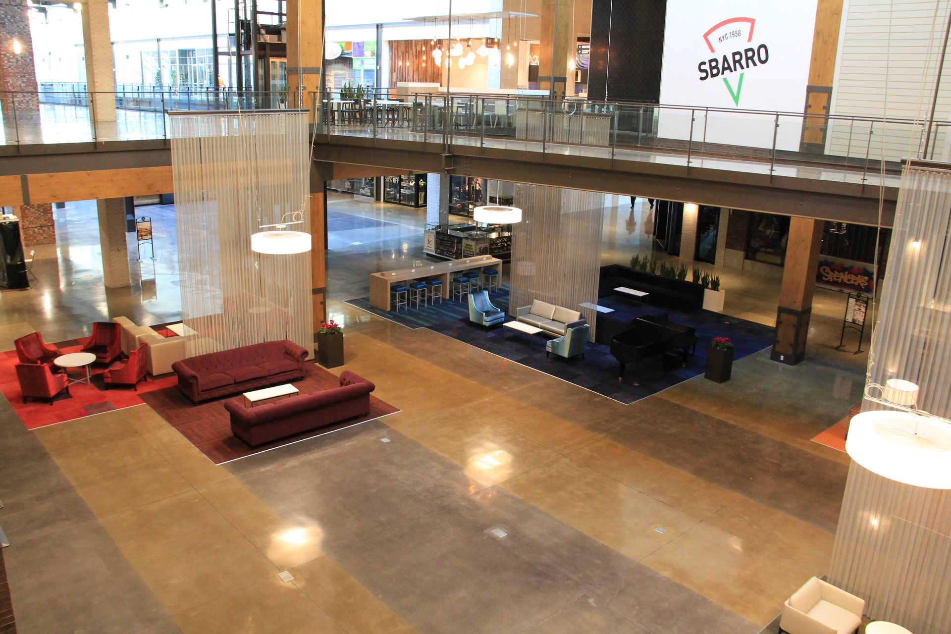 The owners chose solvent-based concrete dye colors, matched to the owner’s selections by Ameripolish: a natural polish meaning no dye was used, Repose Gray and Barcelona Beige.