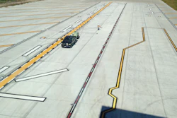 Project cost was estimated around $30 million with the striping subcontract around about $60,000 for Brian Boatner, president of Roads & Runways, and his son Ben. They completed 70,000 sq. ft. of striping in a short two week timeframe.