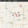 This EAMS overview screen shows individual Helm Group machines on location as red dots. Arrows in the dots show direction of travel, and a square in the dot shows the machine is stopped. Circles with numbers inside represent clusters of assets, with the number representing how many units are on site. As you zoom in the cluster spreads apart to reveal the individual assets.