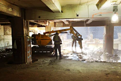 Two 6,700-lb. Brokk 260s with hydraulic breaker attachments were used to remove the warehouse's reinforced floors.