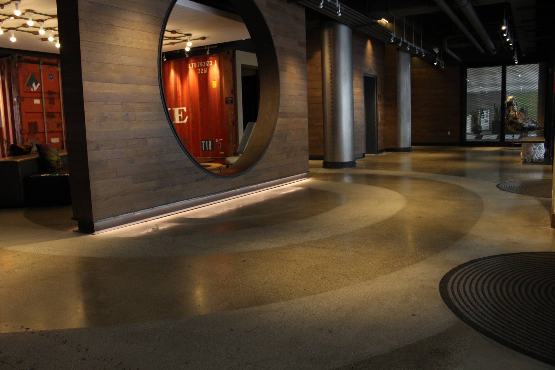 The PolishedCrete team working with Jett Landscape Architecture + Design created a whimsical graphic that resembles a “swirl” effect within the polished concrete surface.
