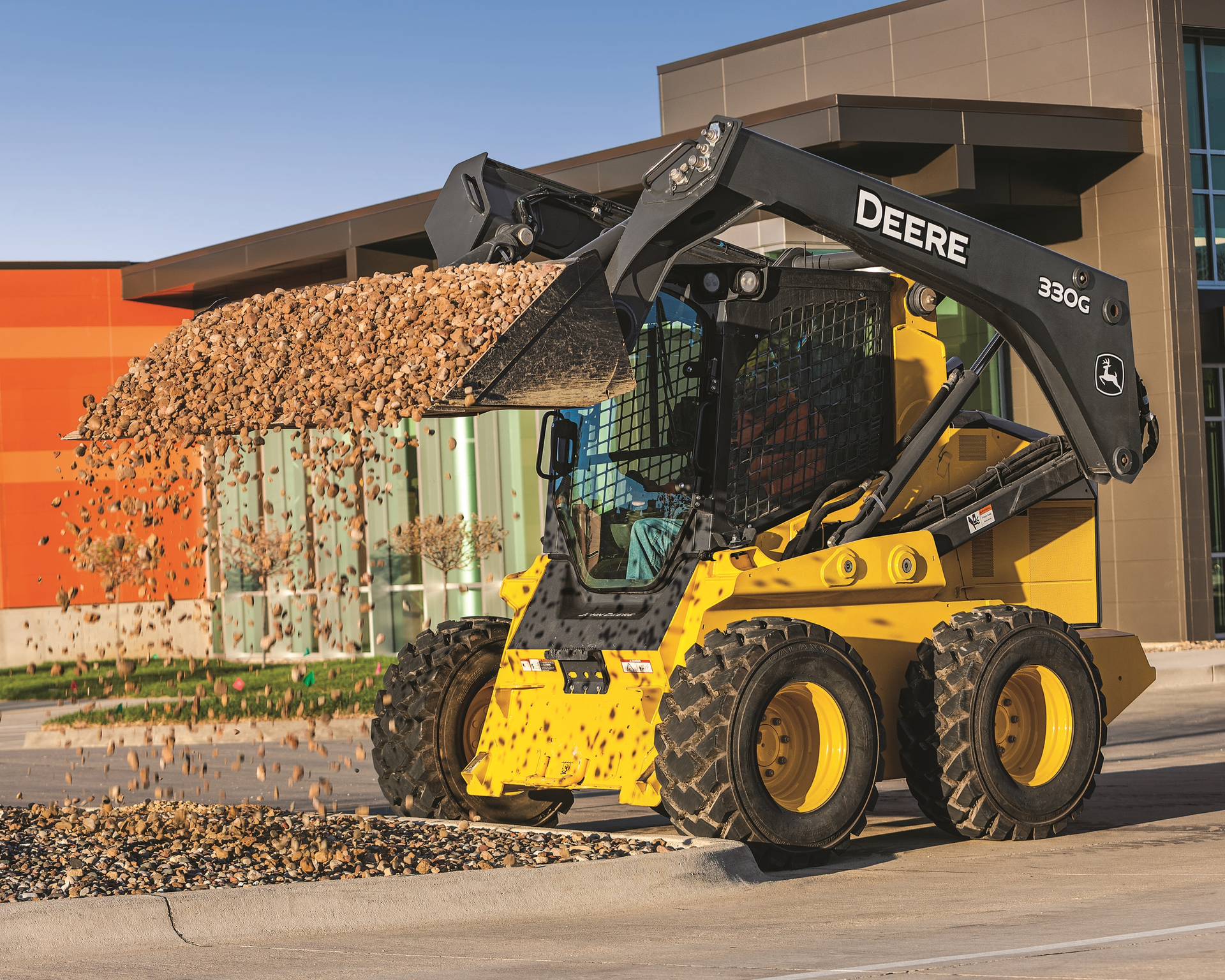 Skid steers are great on harder surfaces like concrete and asphalt, especially with hard tires.